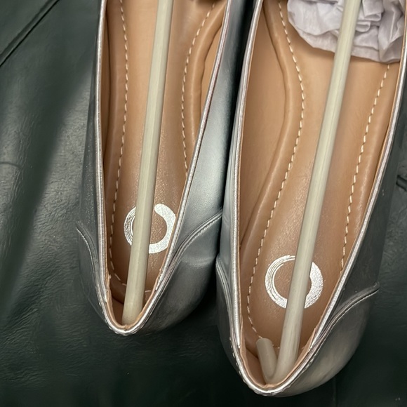 Silver flats never worn. Ordered & arrived from retailer w/o a box as pictured. - Picture 10 of 11